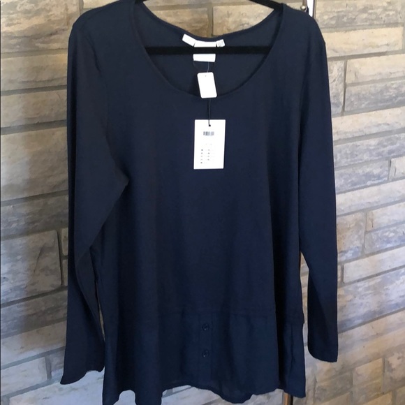 Blue sweater top with blouse detail bottom